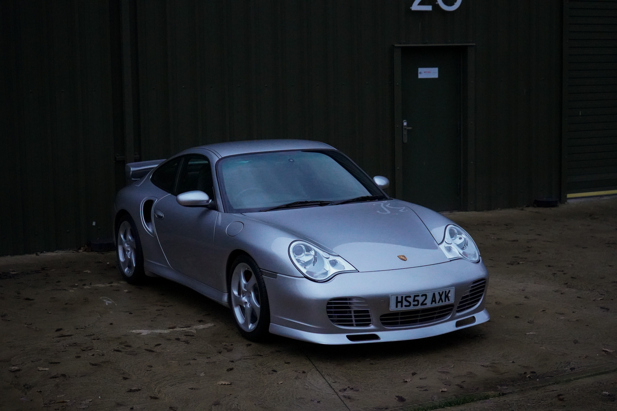 Silver Porsche 911 (996) Turbo X50 Pack in a front three-quarter view.
