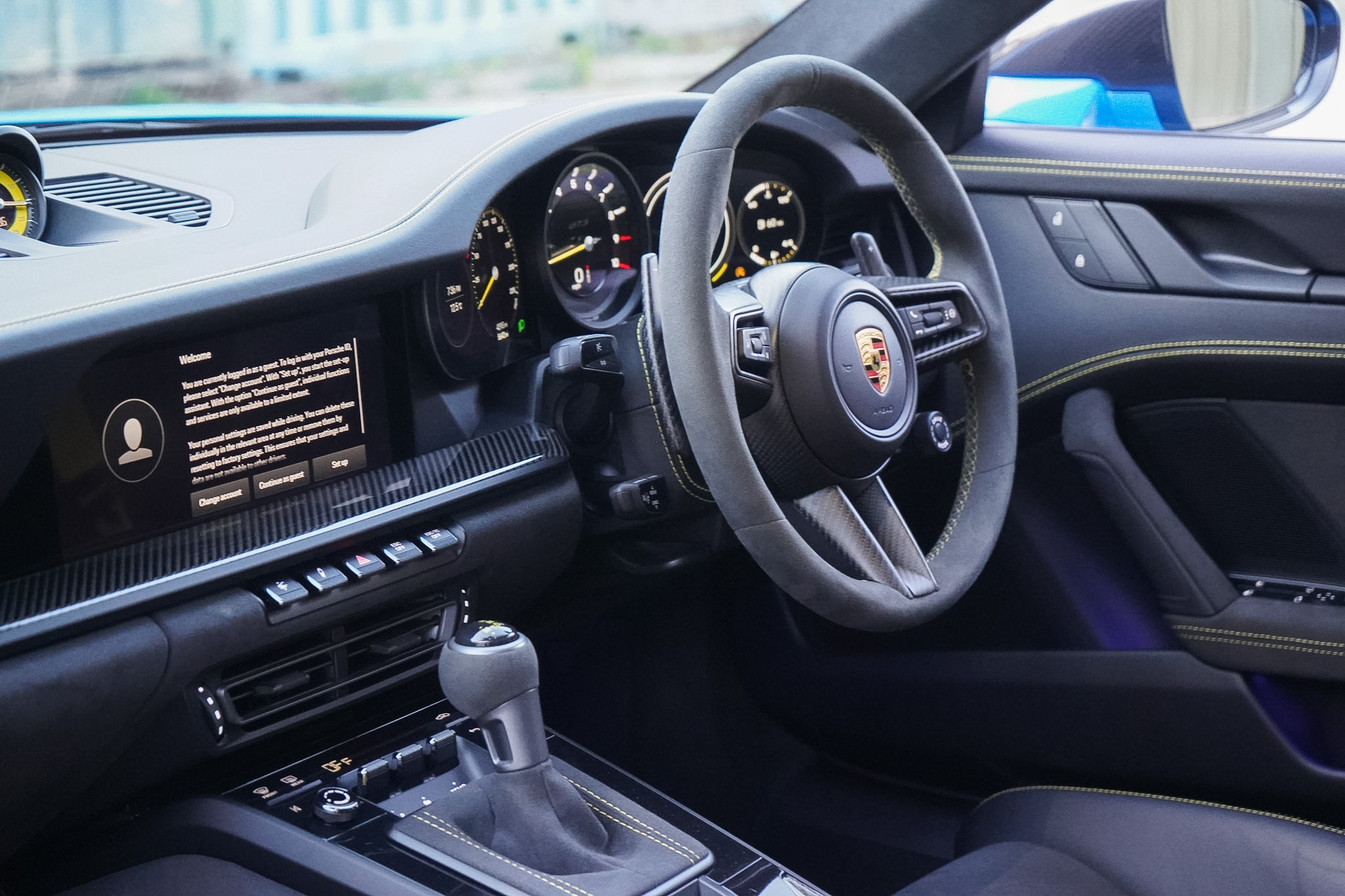 2022 Porsche 911 (992) GT3 cockpit, steering wheel and dashboard view.