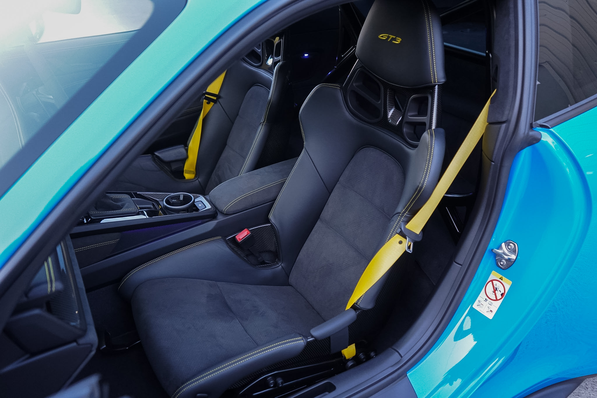 2022 Porsche 911 (992) GT3 front passenger seat and cabin view.